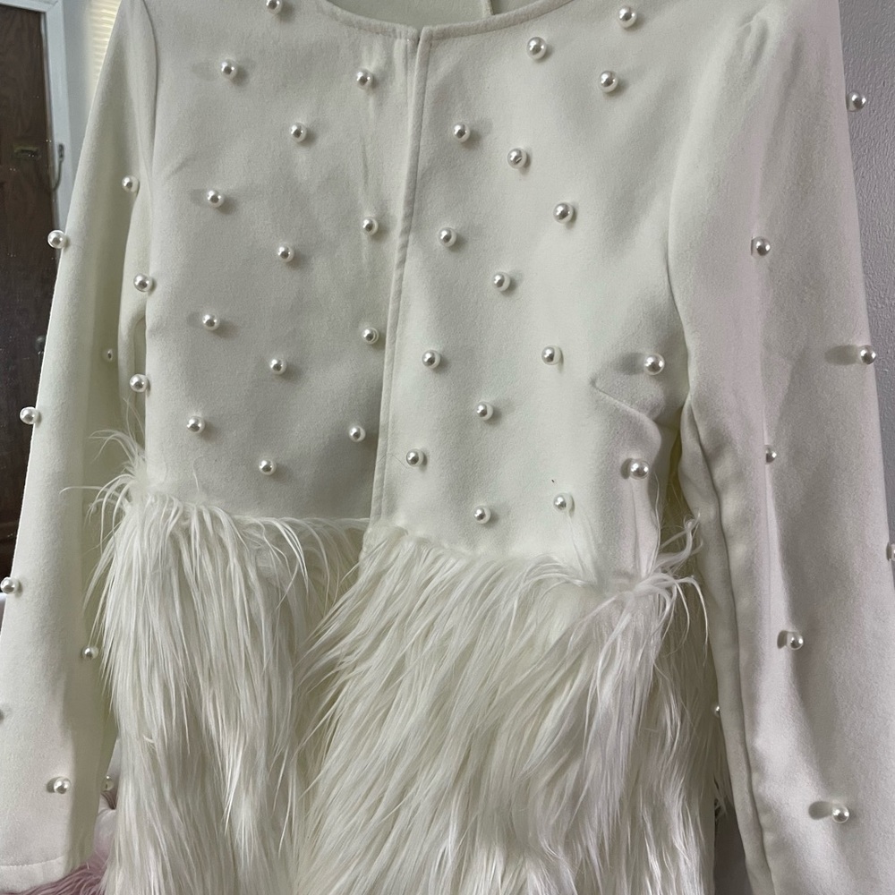 Trendy white coat
